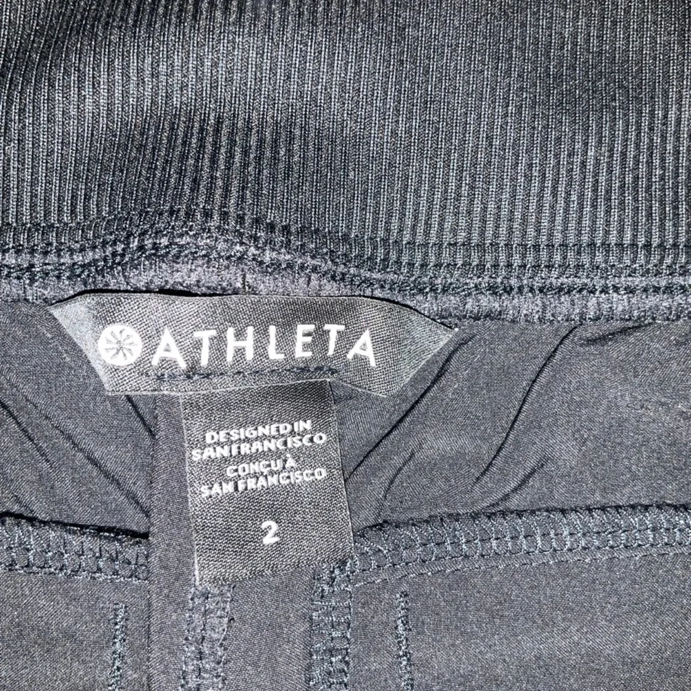 Athleta Brooklyn black ribbed mid rise ankle pants with ribbed side panel, 2 - Picture 6 of 9